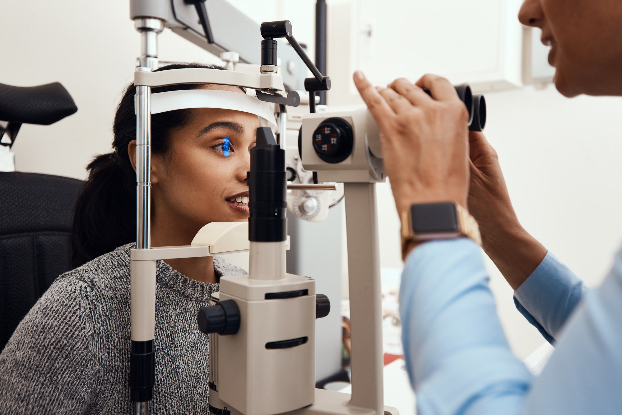 A contact lens exam in progress at the slit lamp